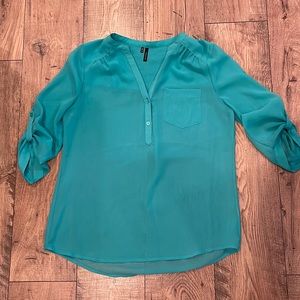 Maurice’s size medium teal 3/4 sleeve top.